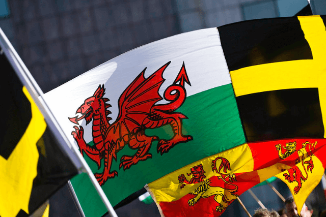 The Welsh Flag and St David's Day Flag raised in the air